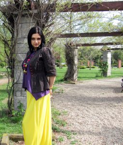 Brunette wearing colorful outfit