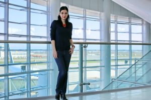 Woman in airport casual outfit